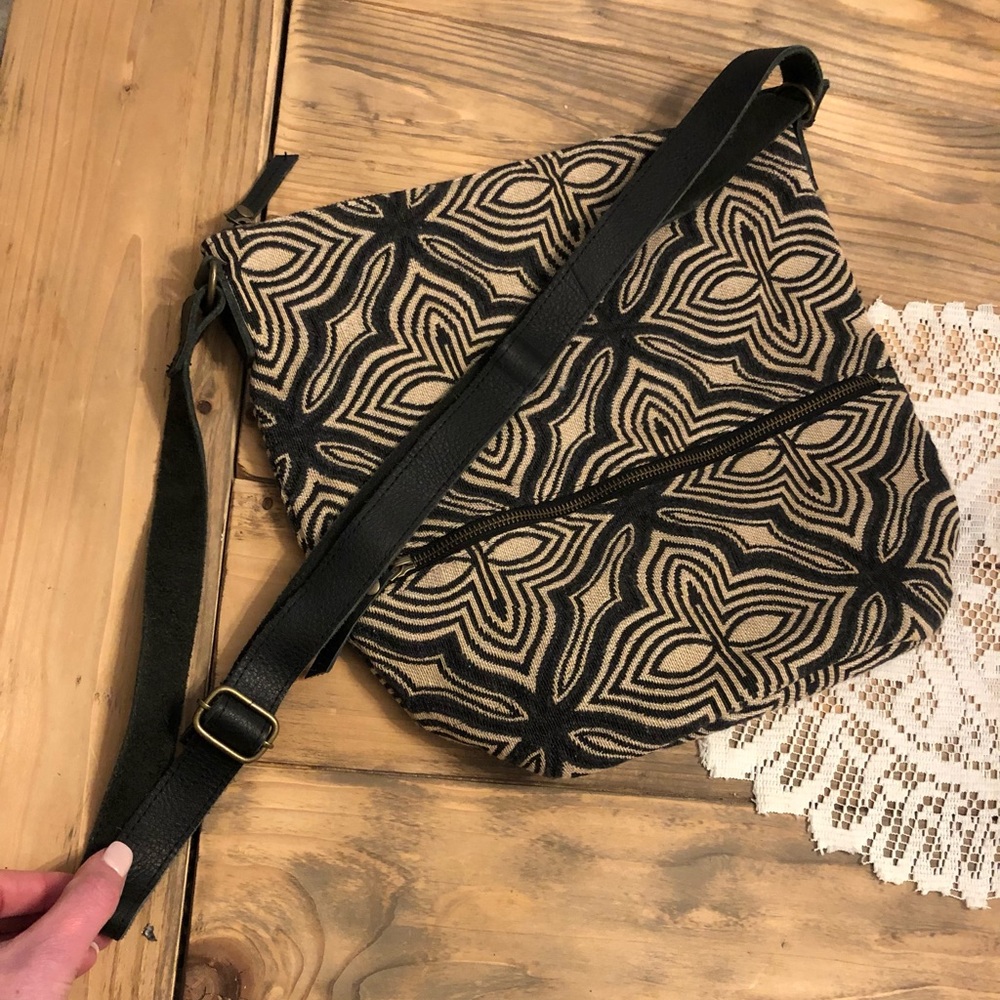 Black and cream knit hobo satchel with bronze zips and buckle. Never used!